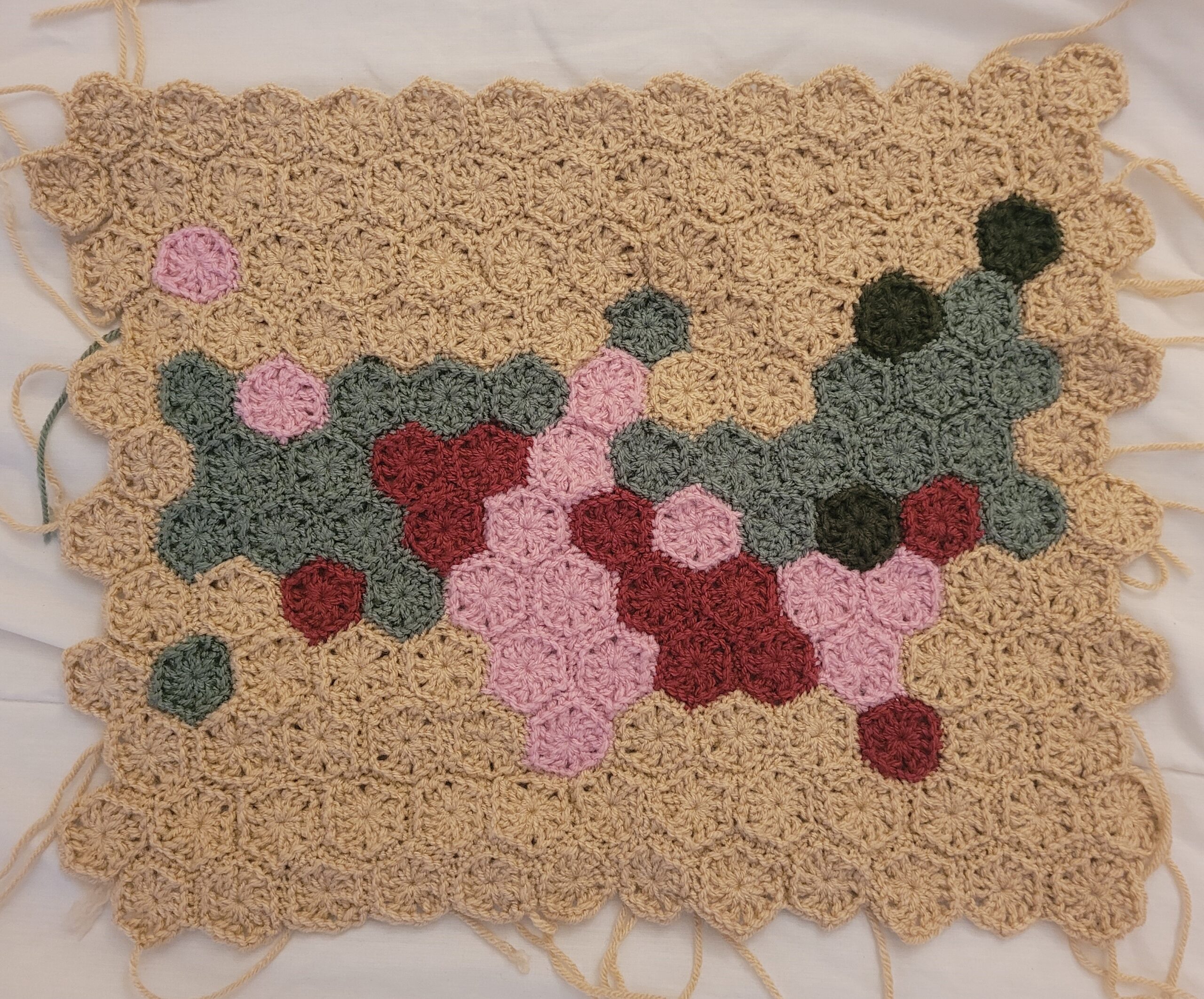 A series of crocheted hexagons stitched together to form the U.S., representing a state and its level of voting rights for the formerly incarcerated. Part of the Stats to Stitches voting and elections series.